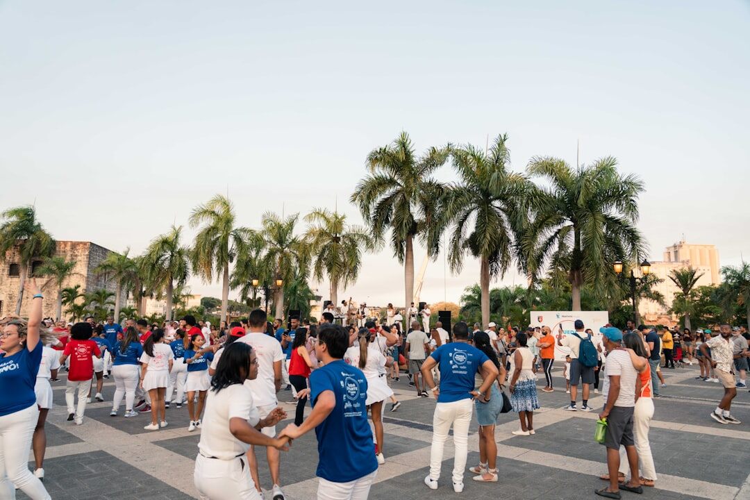 Large group of diverse seniors gathered together smiling at a community event